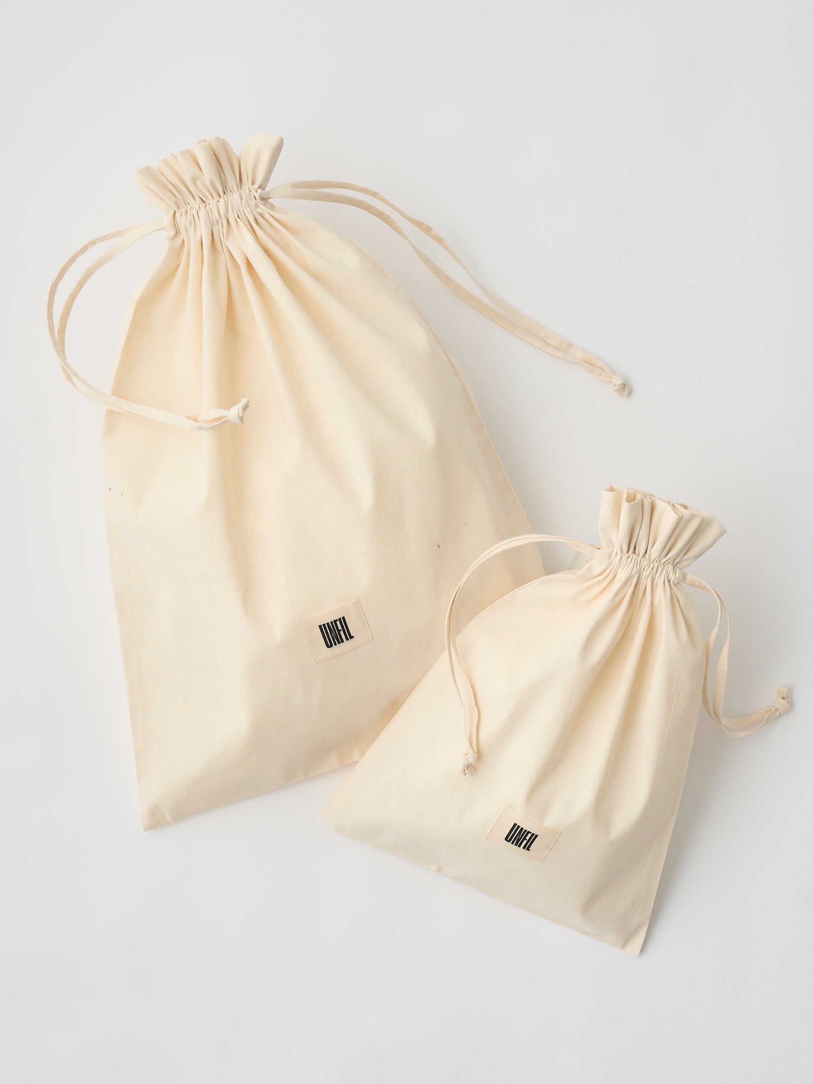 UNFIL ONLINE STORE オリジナル巾着袋でのお届け・配送料改定のお知らせ