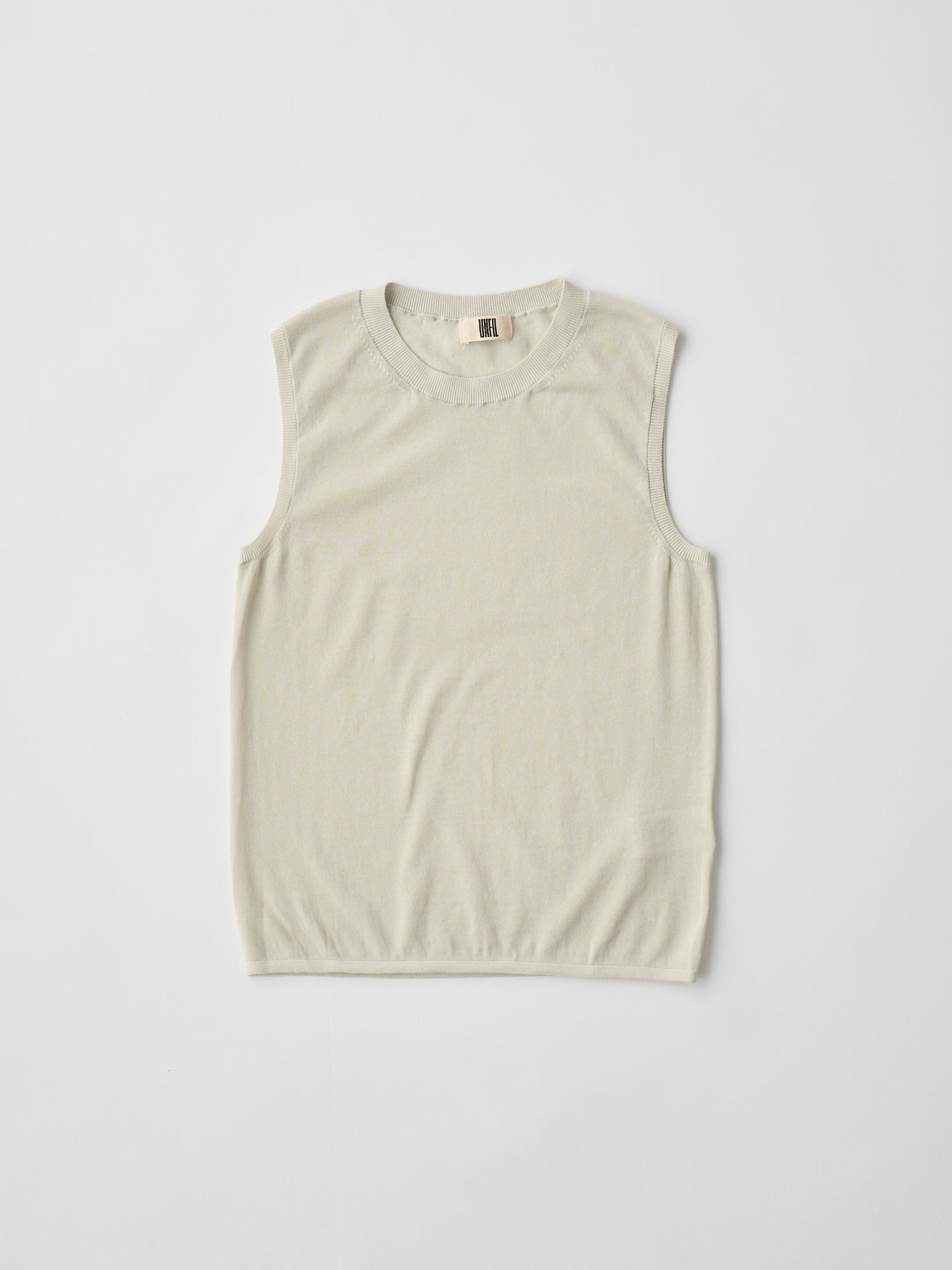HIGH-TWISTED COTTON SHEER KNIT LAYERED SLEEVELESS TOP